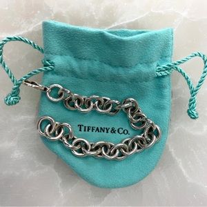 Medium round link bracelet in sterling silver, 7" long.